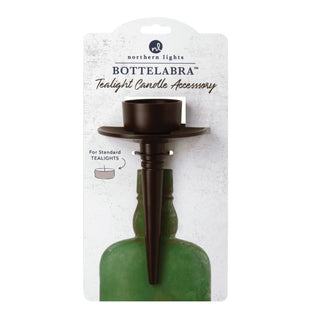 Bronze Bottelabra taper candle holder inserted in a wine bottle | JSQ Mercantile – Women’s Boutique & Gift Shop in La Grange, IL