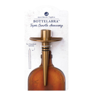 Gold Bottelabra taper candle holder inserted in a wine bottle | JSQ Mercantile – Women’s Boutique & Gift Shop in La Grange, IL
