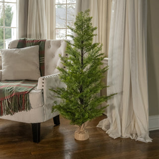 46-inch faux cedar tree in a rustic burlap-wrapped base on white background – JSQ Mercantile, Women’s Boutique & Gift Shop in La Grange, IL.