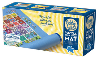 Cobble Hill Puzzle Roll Away Mat for 500- and 1000-piece puzzles with felt surface, rolling tube, and straps for secure storage | JSQ Mercantile – Women’s Boutique & Gift Shop in La Grange, IL