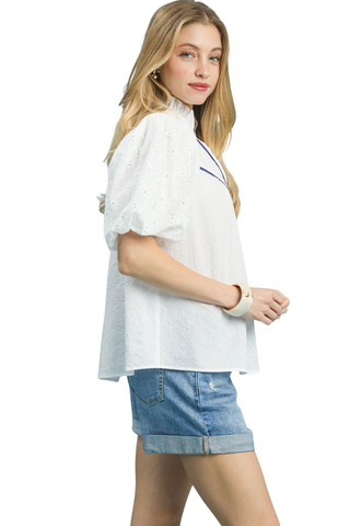 Harper eyelet puff sleeve top with contrast piping and split neckline | JSQ Mercantile – a women’s boutique and gift shop in La Grange, IL