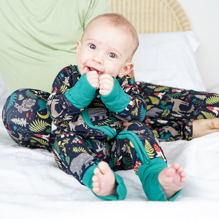 Happy baby wearing night forest bamboo pajamas