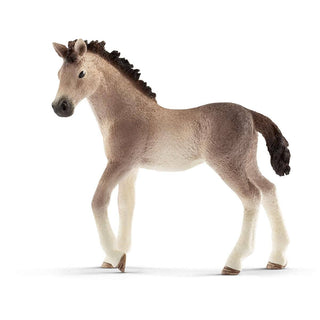 Model horse figurine on a white background
