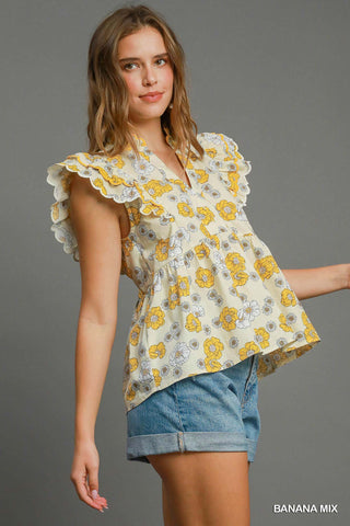 Floral print peplum top with scalloped sleeves and lined cotton fabric for women | JSQ Mercantile – a women’s boutique and gift shop in La Grange, IL.