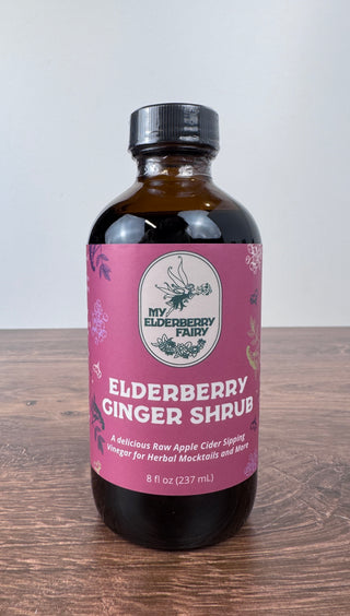 Elderberry Ginger Shrub in 8 oz glass bottle with organic elderberries, ginger, rosehips and raw apple cider vinegar – JSQ Mercantile – a women’s boutique and gift shop in La Grange, IL.