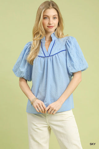 Eyelet puff sleeve cotton top with contrast piping and split neckline for women | JSQ Mercantile – a women’s boutique and gift shop in La Grange, IL.