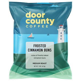 Door County Coffee package with lighthouse and sailboat design on a white background