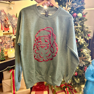 Green sweatshirt with a red vintage Santa face graphic – JSQ Mercantile – a women’s boutique and gift shop in La Grange, IL.
