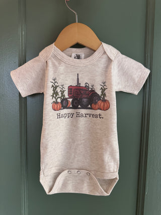 Happy harvest cotton baby onesie with snap close. JSQ mercantile in La Grange IL