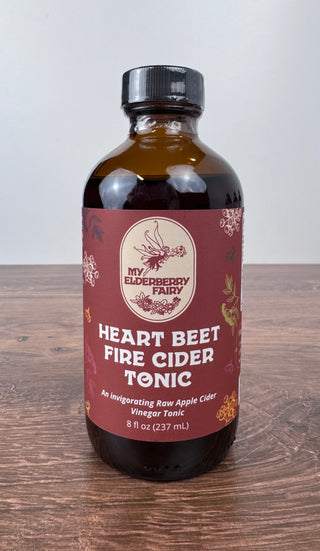 Heart Beet Fire Cider Tonic in 8 oz glass bottle with herbal apple cider vinegar blend for seasonal wellness and circulation support – JSQ Mercantile – a women’s boutique and gift shop in La Grange, IL.