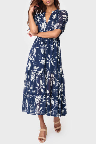 Blue drawstring waist midi dress with puff sleeves and tiered chiffon skirt | JSQ Mercantile – a women’s boutique and gift shop in La Grange, IL.