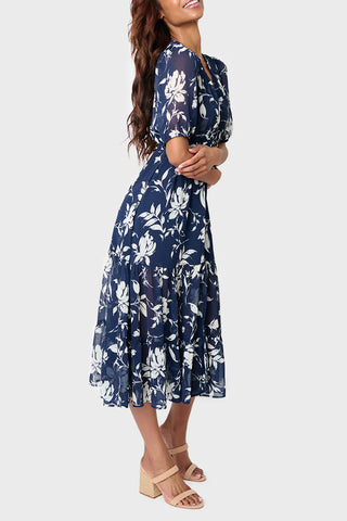 Blue drawstring waist midi dress with puff sleeves and tiered chiffon skirt | JSQ Mercantile – a women’s boutique and gift shop in La Grange, IL.