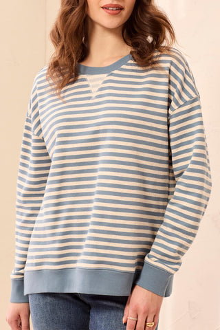 Striped long sleeve top in blue fog with a crew neckline, V-stitch detail, and relaxed fit. | JSQ Mercantile