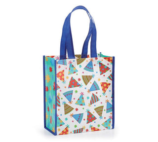 Birthday Wishes party hat tote with white background, colorful birthday hats, and royal blue trim and handles, JSQ Mercantile – a women’s boutique and gift shop in La Grange, IL.