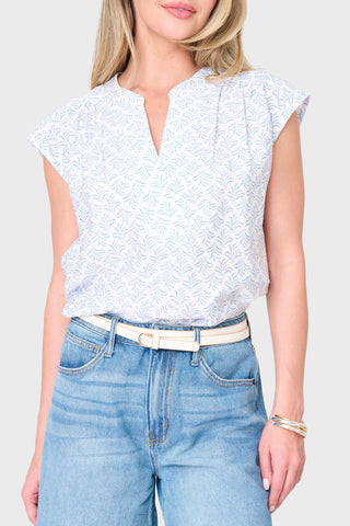 Blue print cap sleeve notch neck blouse with split neckline and shirttail hem | JSQ Mercantile – a women’s boutique and gift shop 