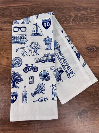 Blue and white Chicago Icons Dish Towel featuring classic city landmarks and symbols | JSQ Mercantile – Women’s Boutique & Gift Shop in La Grange, IL