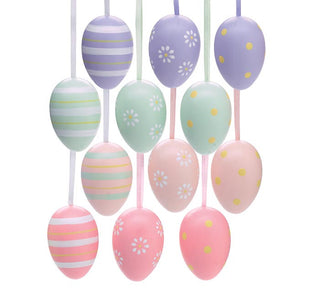 Assorted Easter egg ornaments in mesh bag with pastel colors and floral, polka dot, and stripe designs, JSQ Mercantile – a women’s boutique and gift shop in La Grange, IL.