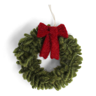 Felt Wreath with Red Bow handmade from soft felt with green leaves and a festive red bow, available at JSQ Mercantile – a women’s boutique and gift shop in La Grange, IL.