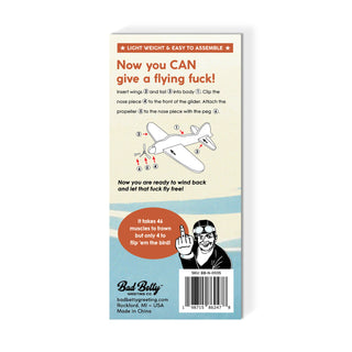 Flying Fuck Foam Mini Glider novelty toy assembled and in packaging – JSQ Mercantile – a women’s boutique and gift shop in La Grange, IL
