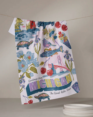 Greetings From Michigan Kitchen Tea Towel with colorful vintage postcard design | JSQ Mercantile – Women’s Boutique & Gift Shop in La Grange, IL
