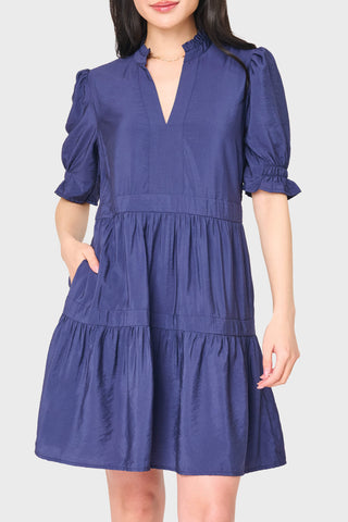 Navy puff sleeve tiered day dress with ruffle neckline and side pockets | JSQ Mercantile – a women’s boutique and gift shop in La Grange, IL.