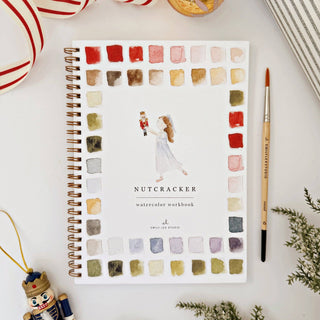 Nutcracker Watercolor Workbook featuring festive holiday illustrations and guided painting pages