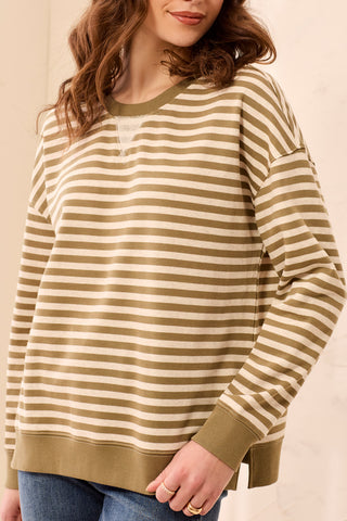 A long sleeve top in aloe with classic stripes, crew neckline, and V-stitch detail.