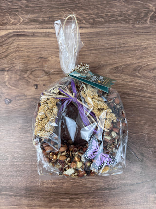 Wreath Tweet 6 inch grapevine birdseed wreath coated in premium birdseed with butterfly and lavender raffia – JSQ Mercantile – a women’s boutique and gift shop in La Grange, IL.